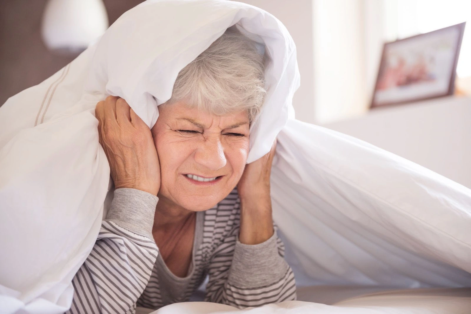 what causes tinnitus in elderly