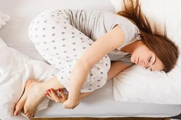 is fetal position best sleeping position for seniors with back pain